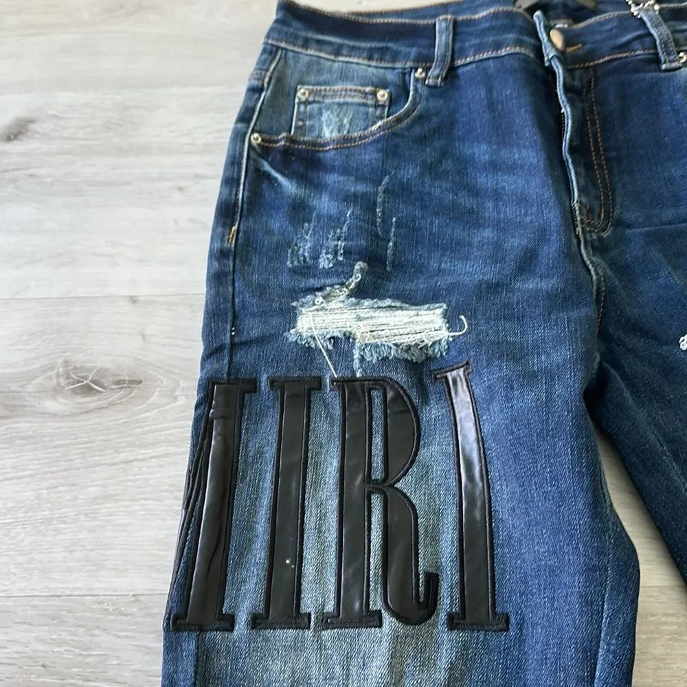AMIRI Skinny-Fit Leather Appliquéd Distressed Jeans Blue/Black 32 NWT